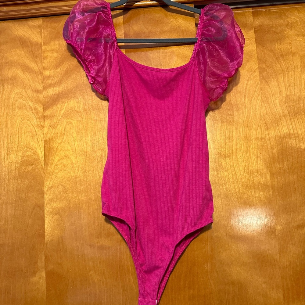 Pink body suit